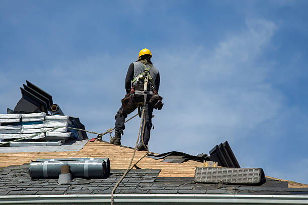 Professional Gutter Installation technician working in Arlington, MA